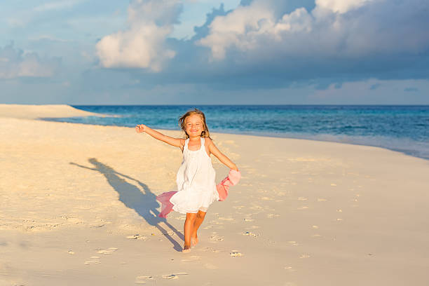 istock Little girl on the beach 515742766