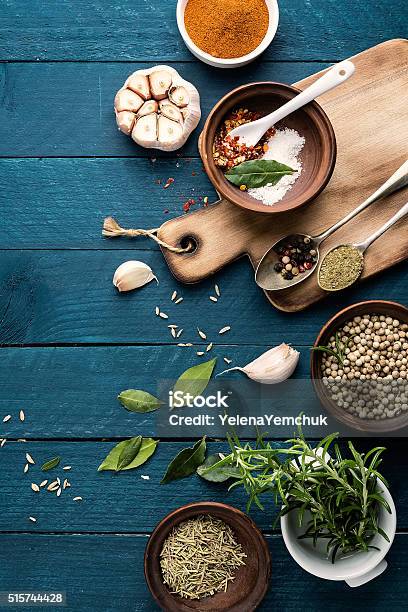 Culinary Background With Spices On Wooden Table Stock Photo - Download Image Now - Allspice, Bay Leaf, Blue