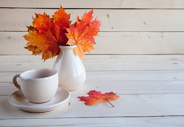istock coffee cup on the autumn fall  leaves 515745755
