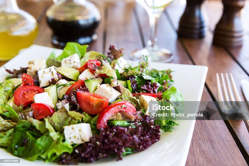 Greek Mediterranean salad Greek Mediterranean salad with feta cheese, tomatoes and peppers. Mediterranean salad. Mediterranean cuisine. Greek cuisine. Salad Stock Photo