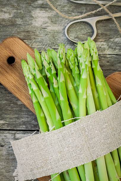 istock bundle of of ripe organic asparagus 515747473