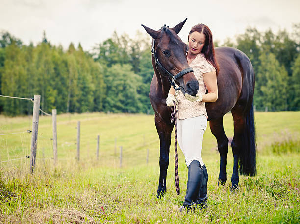istock Woman and horse 515768737
