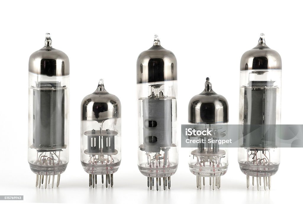 Glass vacuum radio tubes Vacuum radio tubes over white History Stock Photo