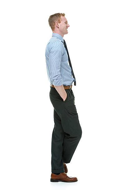 istock Smiling businessman standing with hand in pocket 515770809