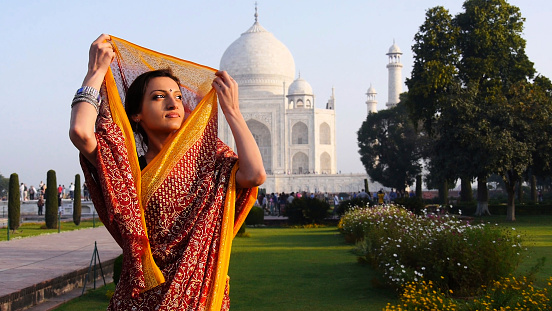 Woman wearing sari at Taj Mahal