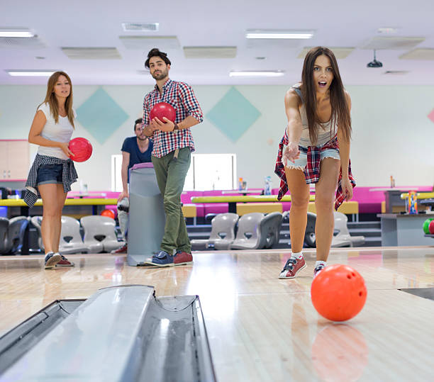 istock Cheerful Friends Bowling Together. 515773041