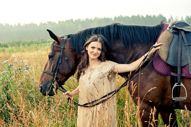 istock Pretty woman with horses 515774975