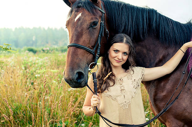 istock Pretty woman with horses 515775185