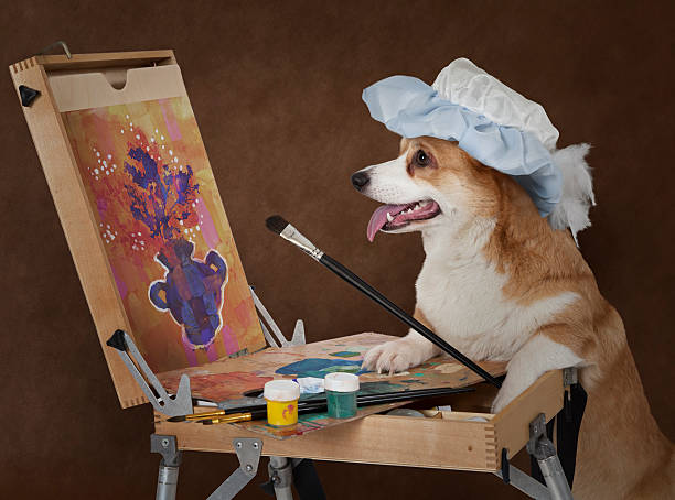 perro artista pintando con flores de vida - paint can fotografías e imágenes de stock
