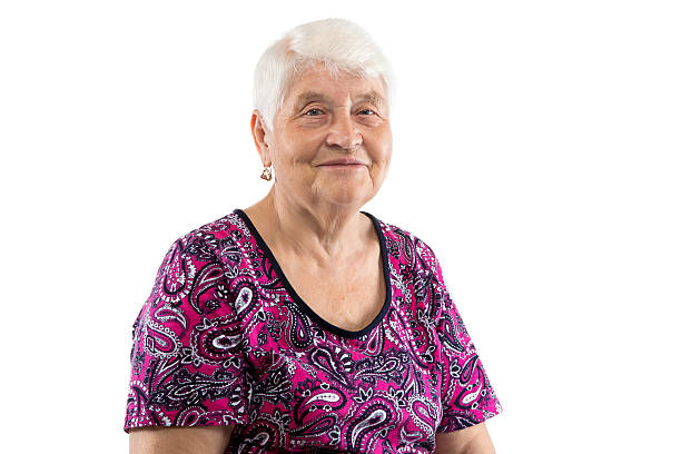 istock Sitting smiling elderly lady with white hair 515779896