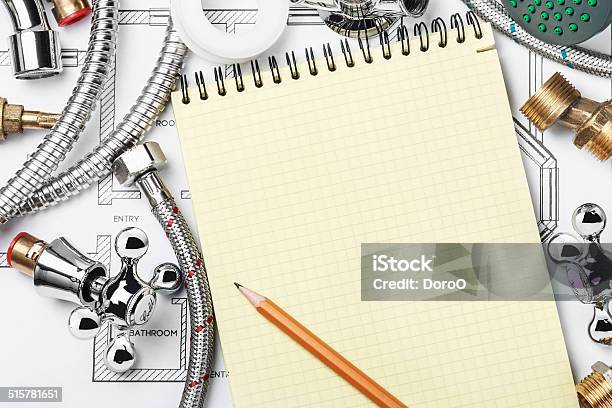 Plumbing And Tools With A Notebook Stock Photo - Download Image Now - Backgrounds, Bathroom, Construction Industry