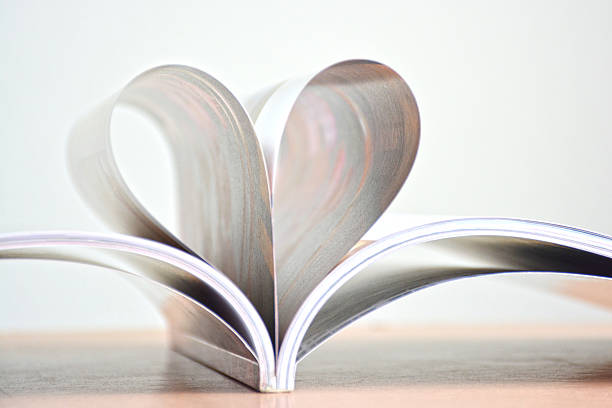 istock Close up heart shape of book pages. 515781753