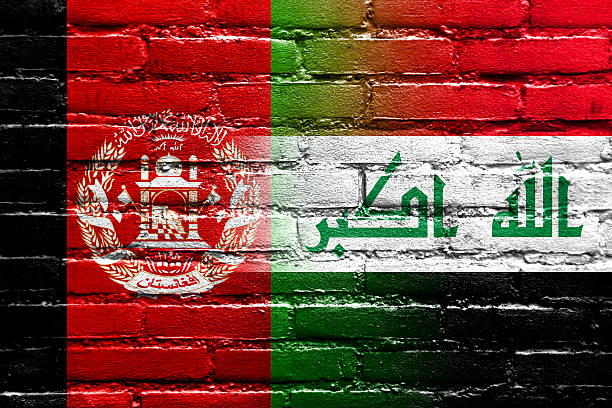 istock Afghanistan and Iraq Flag painted on brick wall 515783595