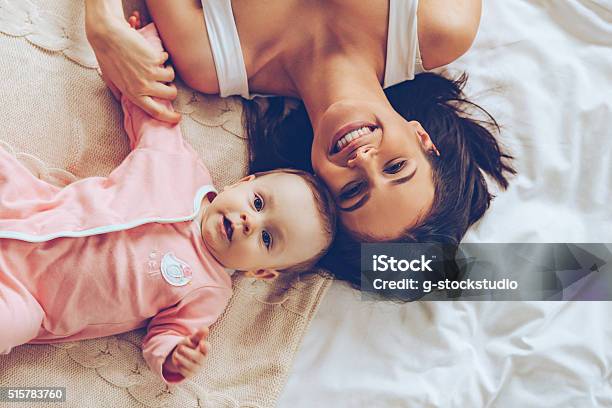 Pure Happiness Stock Photo - Download Image Now - Mother, Baby - Human Age, Bed - Furniture