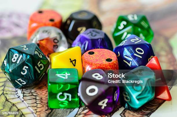 Role Playing Dices Lying On Picture Background Stock Photo - Download Image Now - Dragon, Dungeon, Abstract