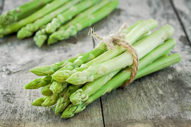 istock bundle of of ripe organic asparagus 515785079