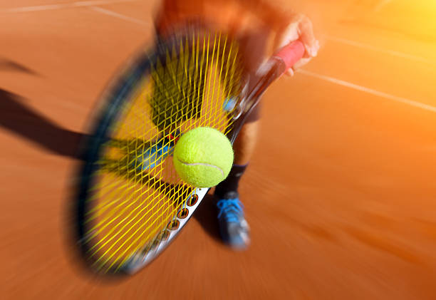 macho tenista em ação - tennis tennis racket racket tennis ball imagens e fotografias de stock