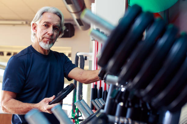 istock Senior Caucasian Man Working Out at the Gym 515786510