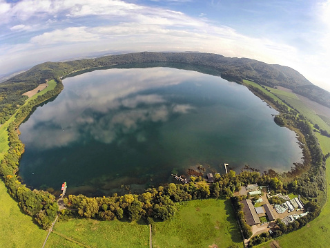 Aerial view on Laacher See - a volcanic caldera lake with a diameter of 2 km in Rhineland-Palatinate, Germany