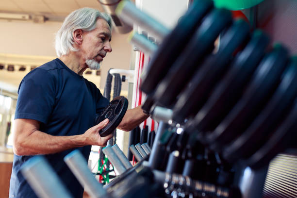 istock Senior Caucasian Man Working Out at the Gym 515786788