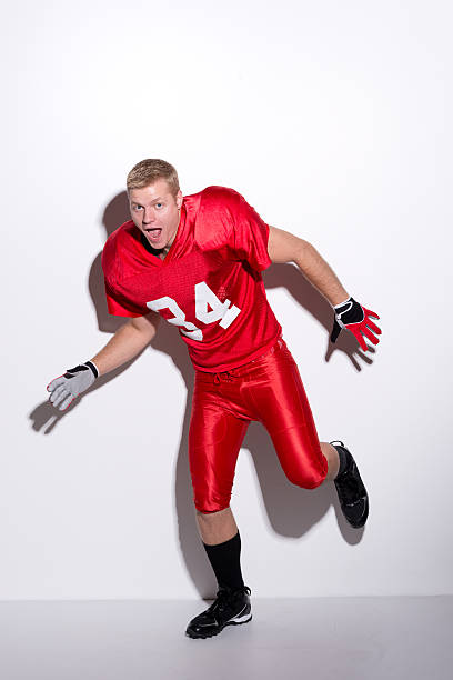 istock American football player being playful / silly 515787043