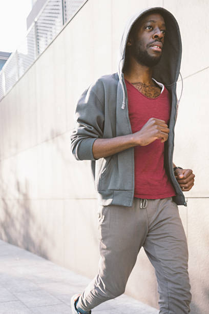 istock Cheerful Man Running Outdoors In The Early Morning 515787600