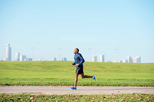 istock Man running in city park. 515788376