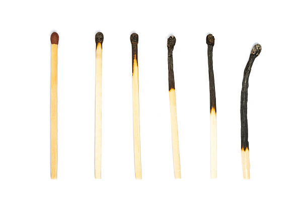 The life of a match One unused match and several burned matches. unlit match stock pictures, royalty-free photos & images