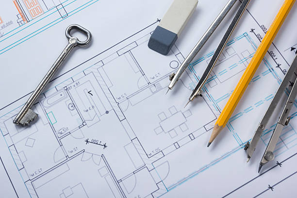 istock Architect worplace top view. Architectural project, blueprints, blueprint rolls and 515792010