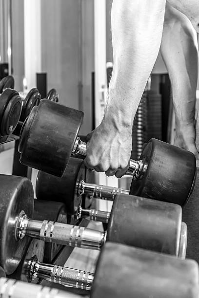istock man in gym, black and white photography 515792218