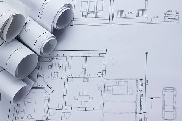 arquiteto worplace vista superior. projeto de arquitetura de projectos, modelo em rolos - blueprint office plan paper imagens e fotografias de stock