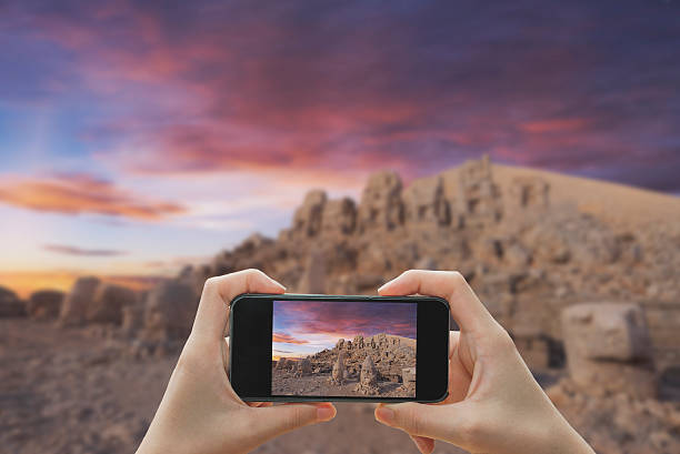 istock Taking photo on smart phone concept.Nemrut Mountain 515801684
