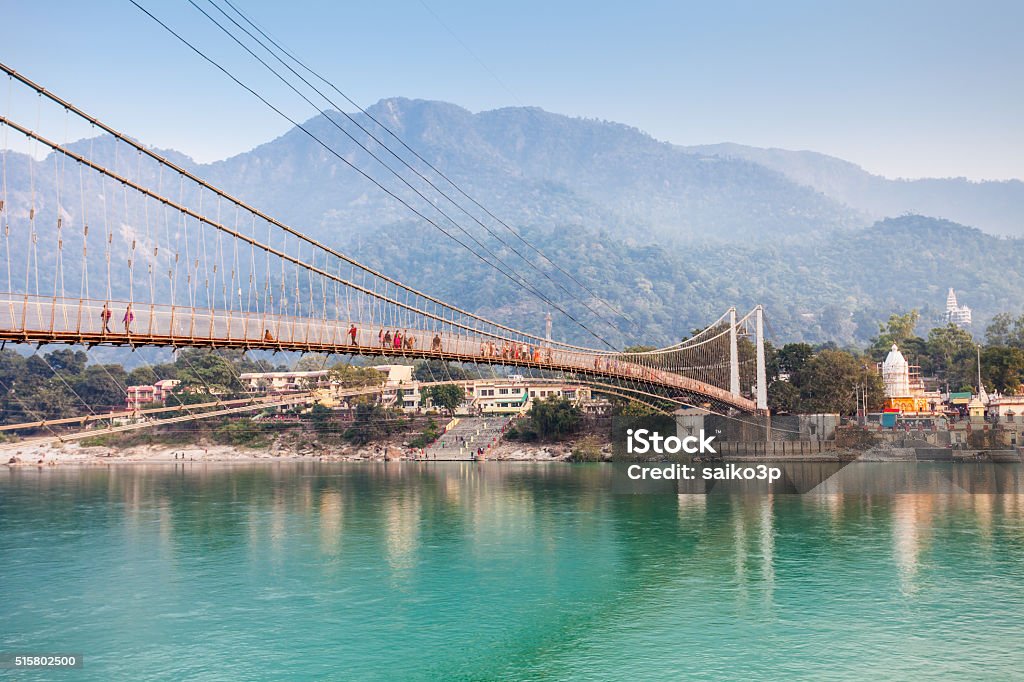 Bridge in Rishikesh Lakshman Jhula is an iron suspension bridge situated in Rishikesh, Uttarakhand state of India. Rishikesh Stock Photo