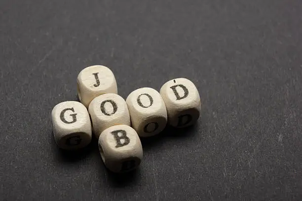 Photo of GOOD JOB text on a wooden cubes