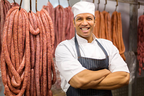 istock mid age butcher with arms crossed 515804586