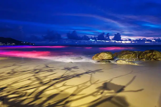 Tropical beach after sunset in beachbar lights. Nature background