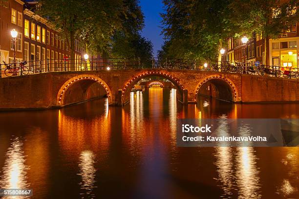 Night City View Of Amsterdam Canals And Seven Bridges Stock Photo - Download Image Now