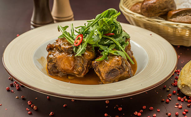 istock beef tails stew with wine and vegetables 515809328