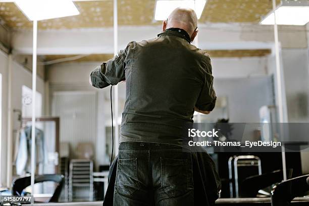 Rear View Of Barber Cutting Hair Stock Photo - Download Image Now - Owner, Rear View, Small Business