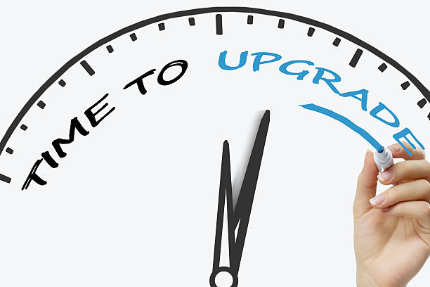istock Hand writing Time to Upgrade concept with blue marker on 515810326