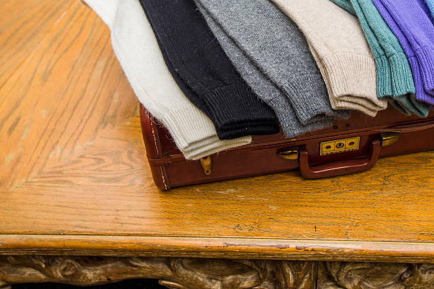 istock Cashmere Sweater cuffs on briefcase 515810707