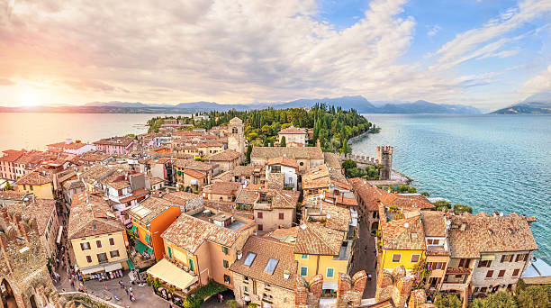 Aerial view on Sirmione, Italy Panoramic aerial view on historical town Sirmione on peninsula in Garda lake, Lombardy, Italy italian lake district photos stock pictures, royalty-free photos & images