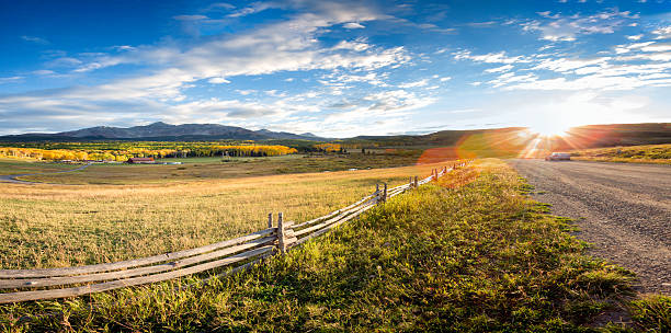 Colorado Mountain Ranch in Autumn Ranch at the foot of Wilson Peak in southwest Colorado in the fall. wide field stock pictures, royalty-free photos & images