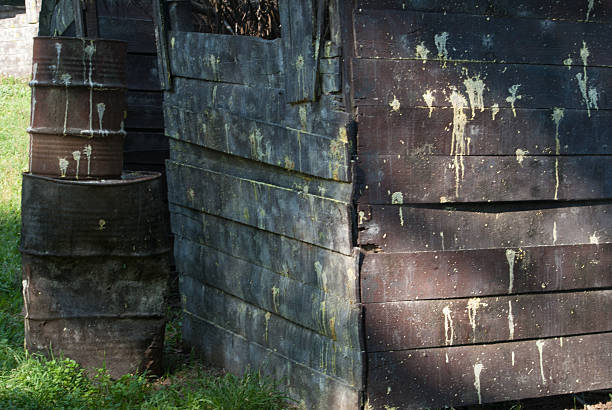 istock paintball safe house wall and barrels- close up 515815328