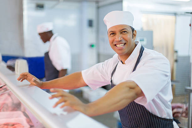 istock mature male butcher looking at the camera 515815348