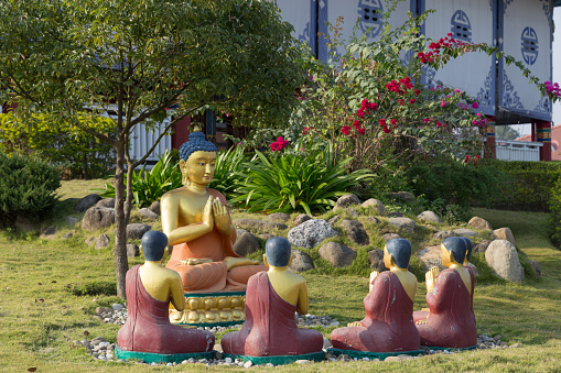 Lumbini, Nepal - November 26, 2014: Photograph of Buddha Statues at the Tara Foundation Lotus Stupa also known as German Temple