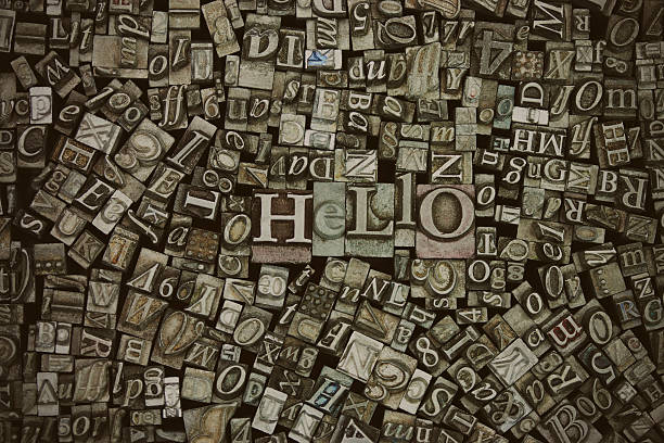 istock Close up of typeset letters with the word Hello 515825346