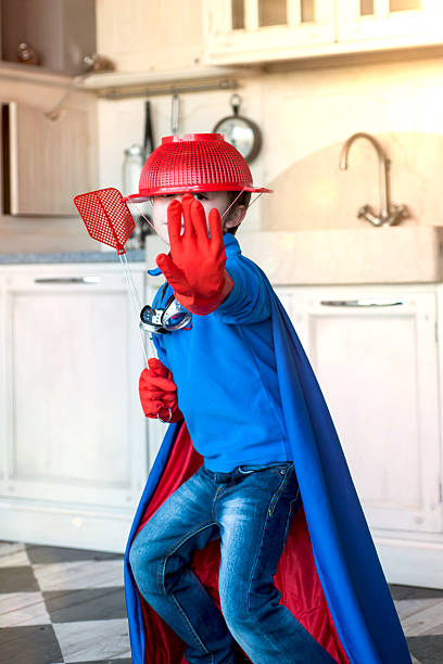 小さなスーパーヒーローのキッチン - superhero child creativity little boys ストックフォトと画像