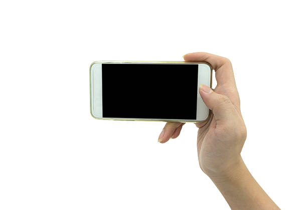 istock Hand holding smart phone isolated over white background - mockup 515825994