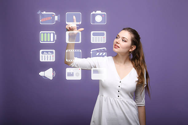 istock Woman pressing high tech type of modern multimedia buttons on 515826150